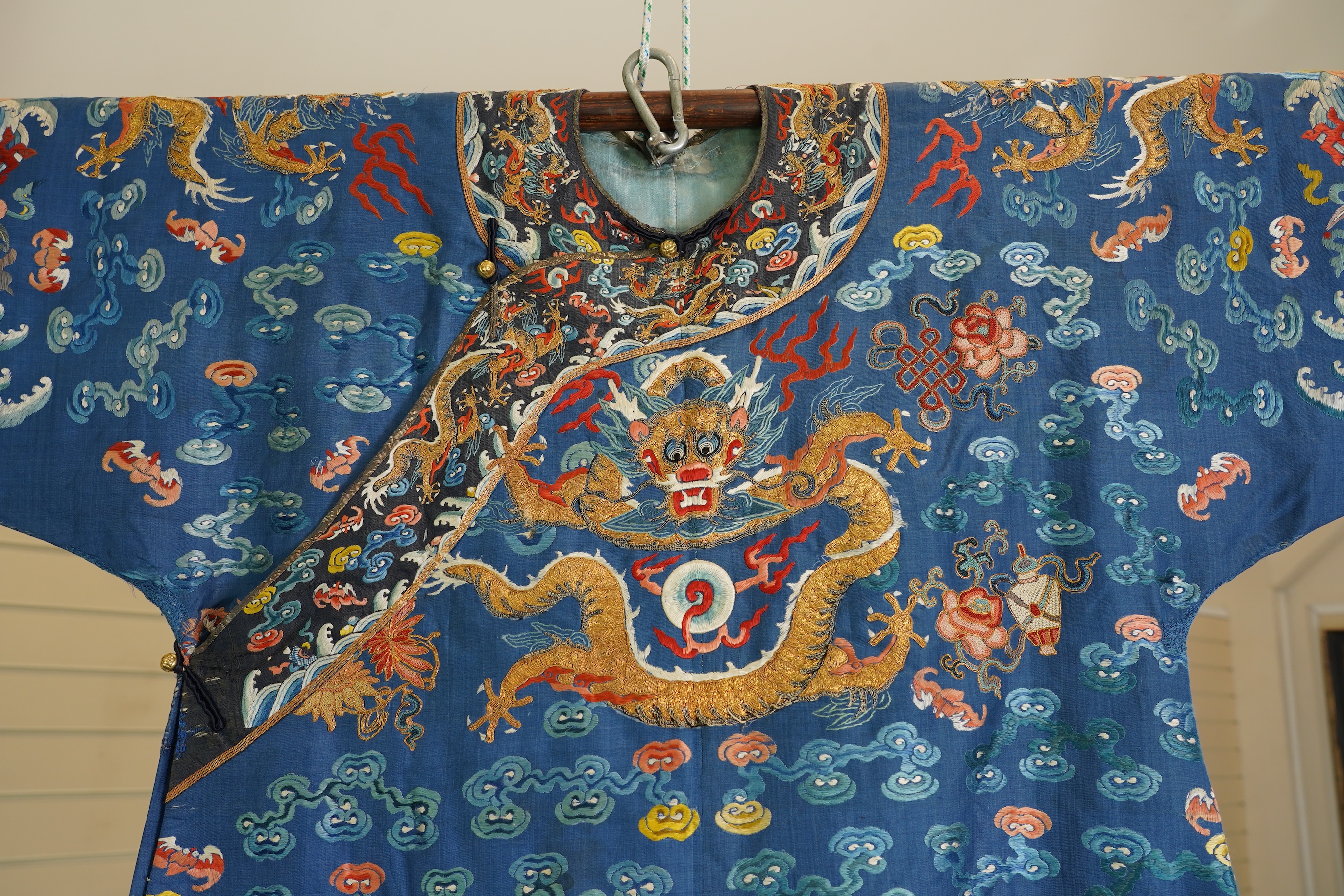 A Chinese blue silk man’s dragon robe, jifu, 19th century